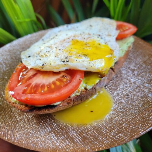 Bruschetta w/ Avocado Dip, Tomatoes, & Runny Egg