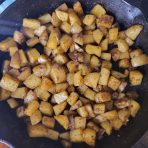 Enchiladas w/ Pinto Beans, Spanish Rice, & Roasted Potatoes