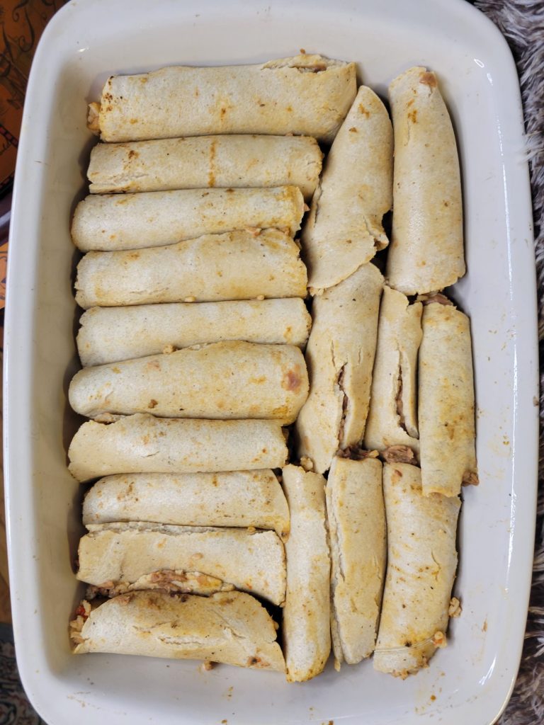 Enchiladas w/ Pinto Beans, Spanish Rice, & Roasted Potatoes