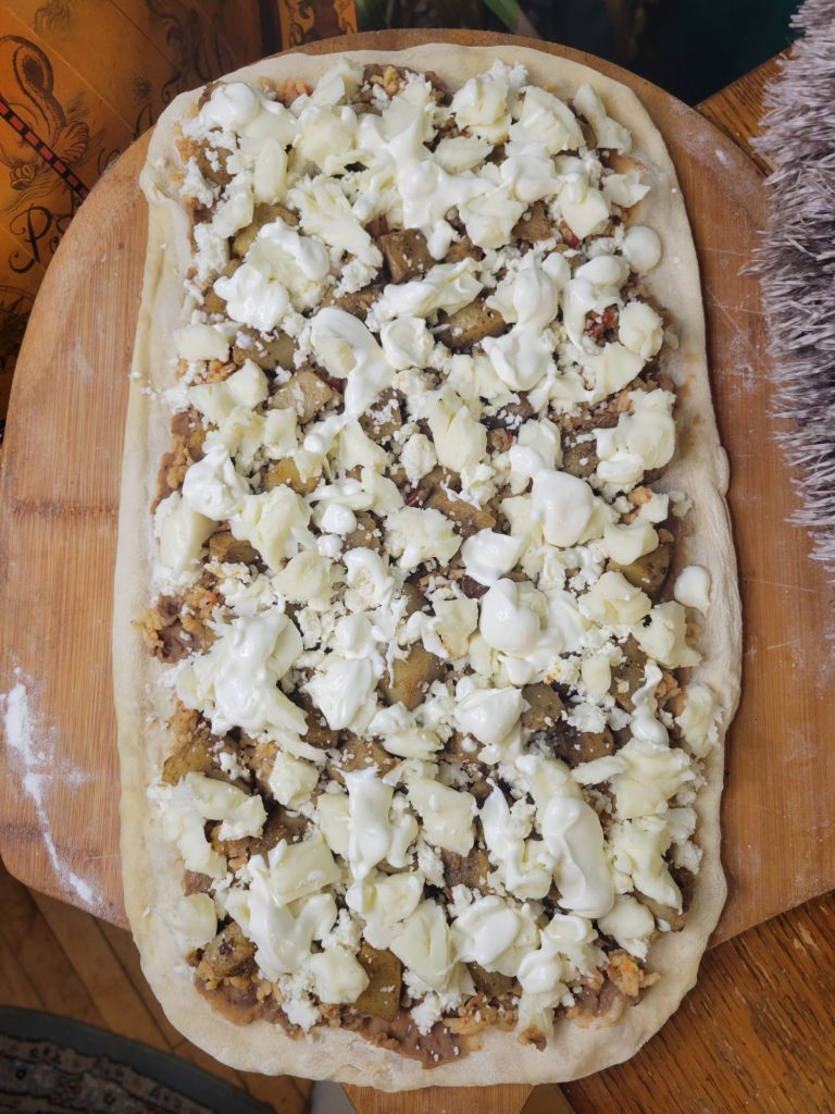 Pizza w/ Pinto Beans, Spanish Rice, & Roasted Potatoes