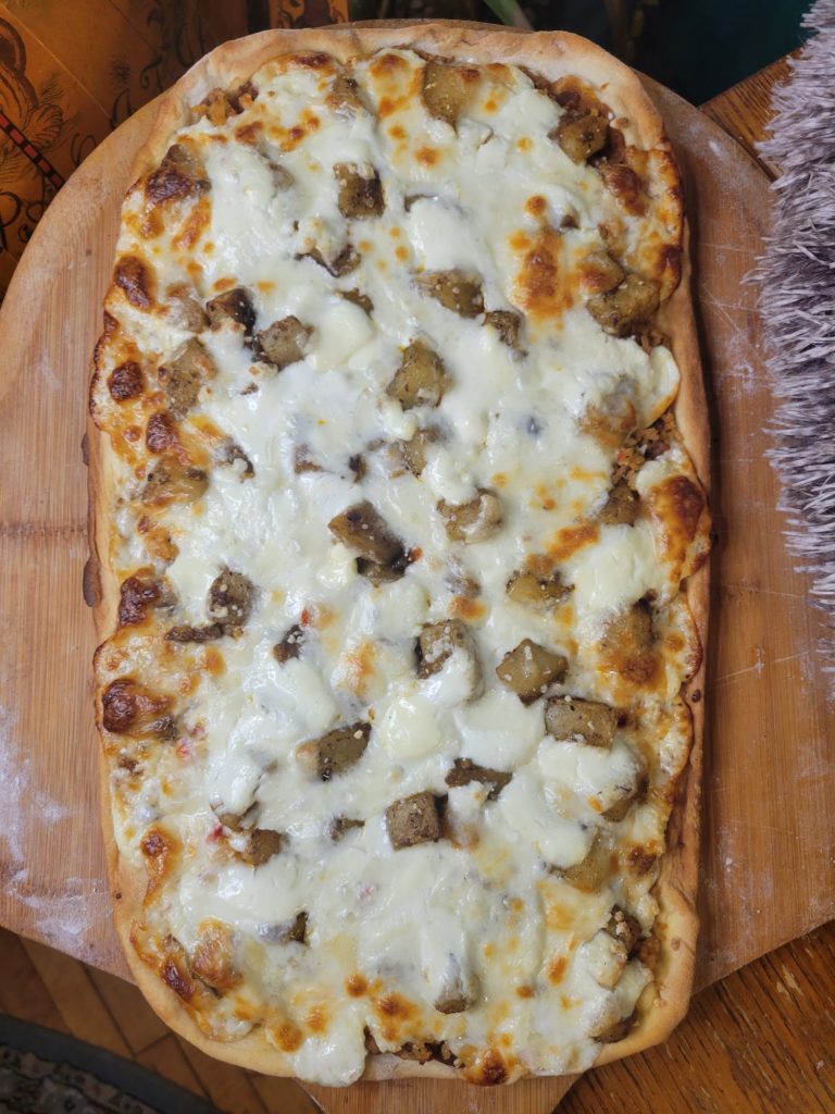 Pizza w/ Pinto Beans, Spanish Rice, & Roasted Potatoes