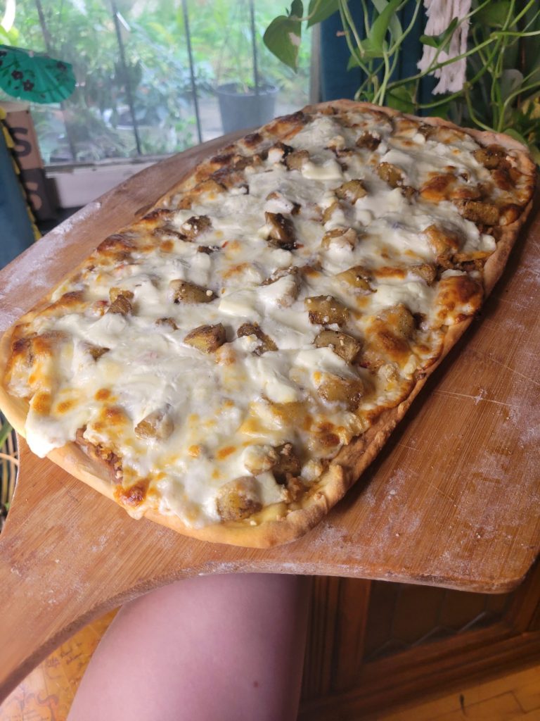 Pizza w/ Pinto Beans, Spanish Rice, & Roasted Potatoes