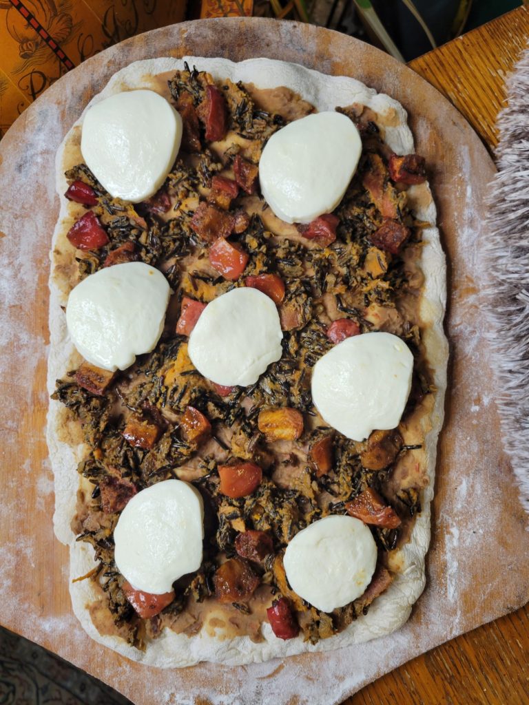 Pizza w/ Refried Beans, Wild Rice, Apples, & Crema