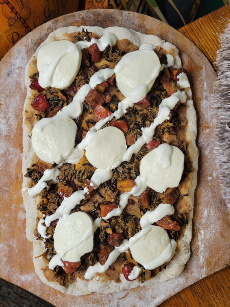Pizza w/ Refried Beans, Wild Rice, Apples, & Crema