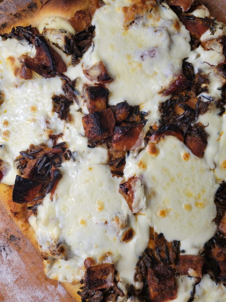 Pizza w/ Refried Beans, Wild Rice, Apples, & Crema