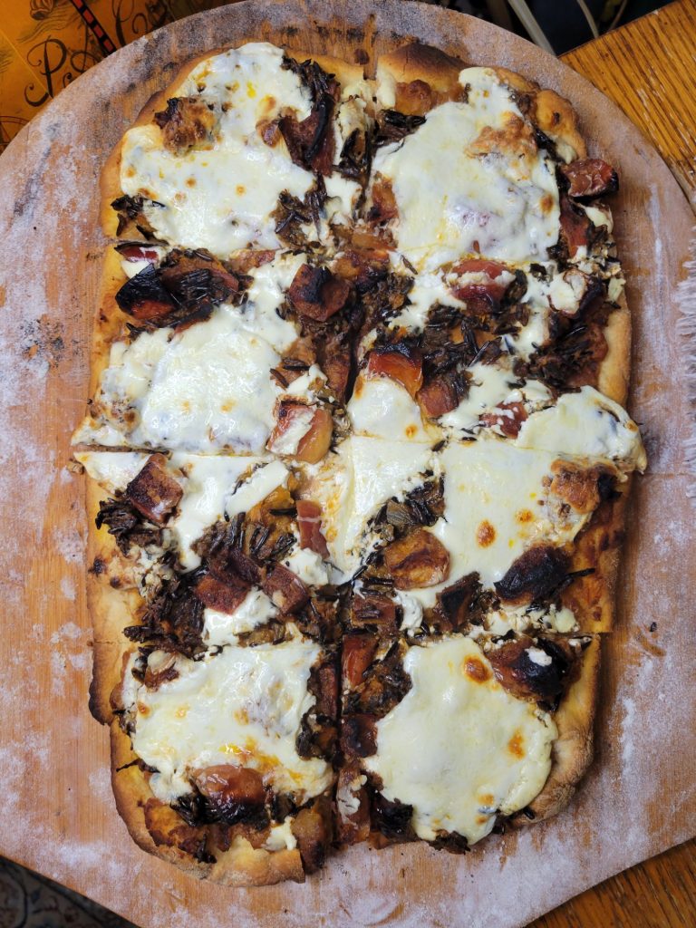 Pizza w/ Refried Beans, Wild Rice, Apples, & Crema